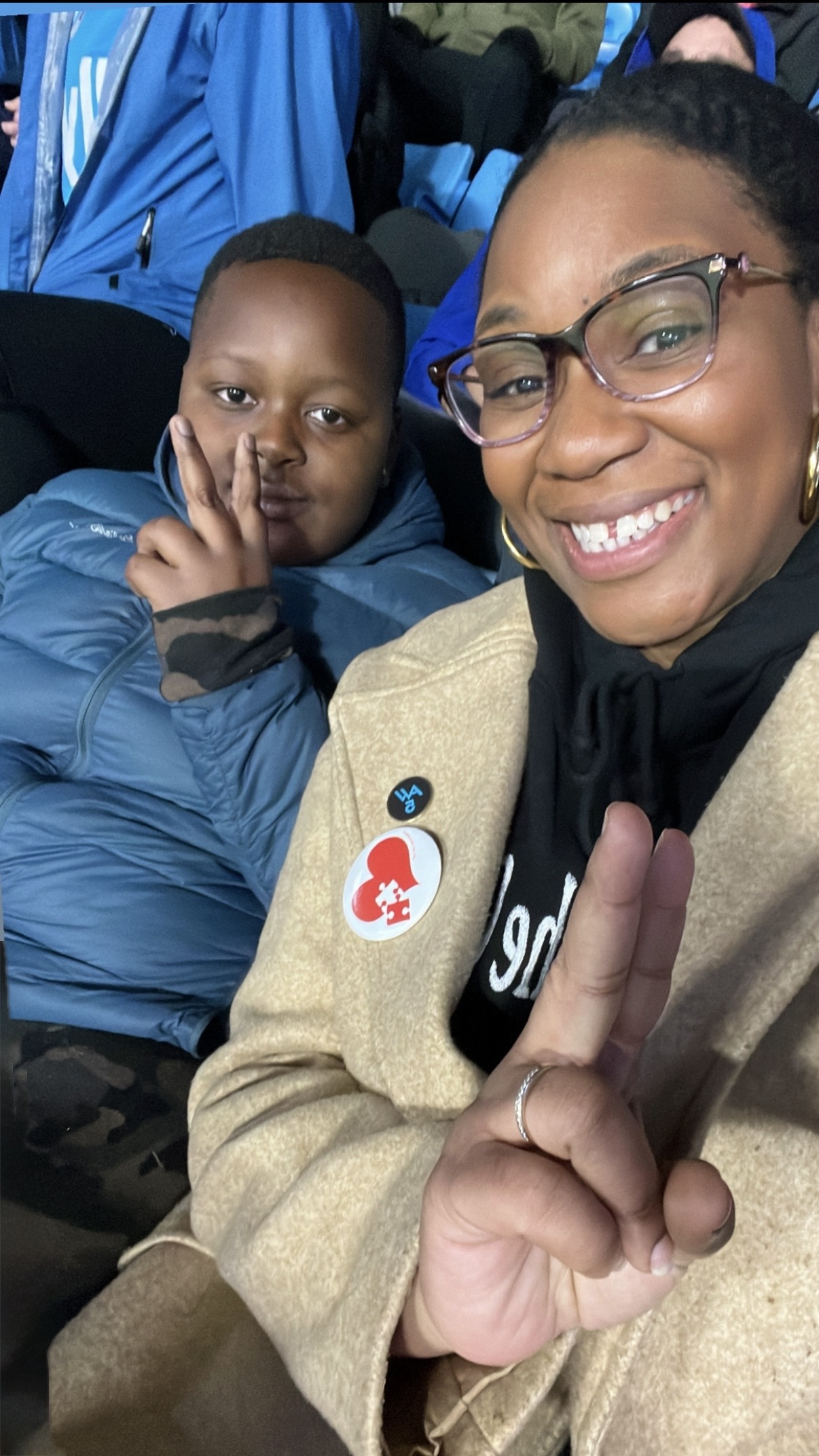 A mother and her child enjoying time together at a community event.