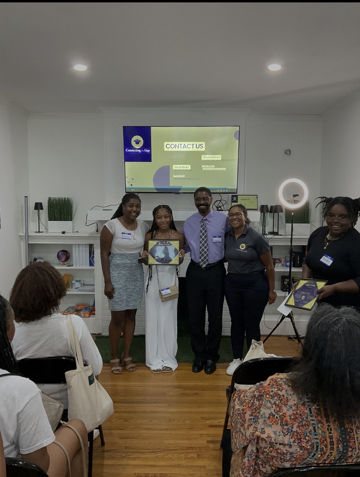 Award recipients celebrating together at a Connecting the Gap event.
